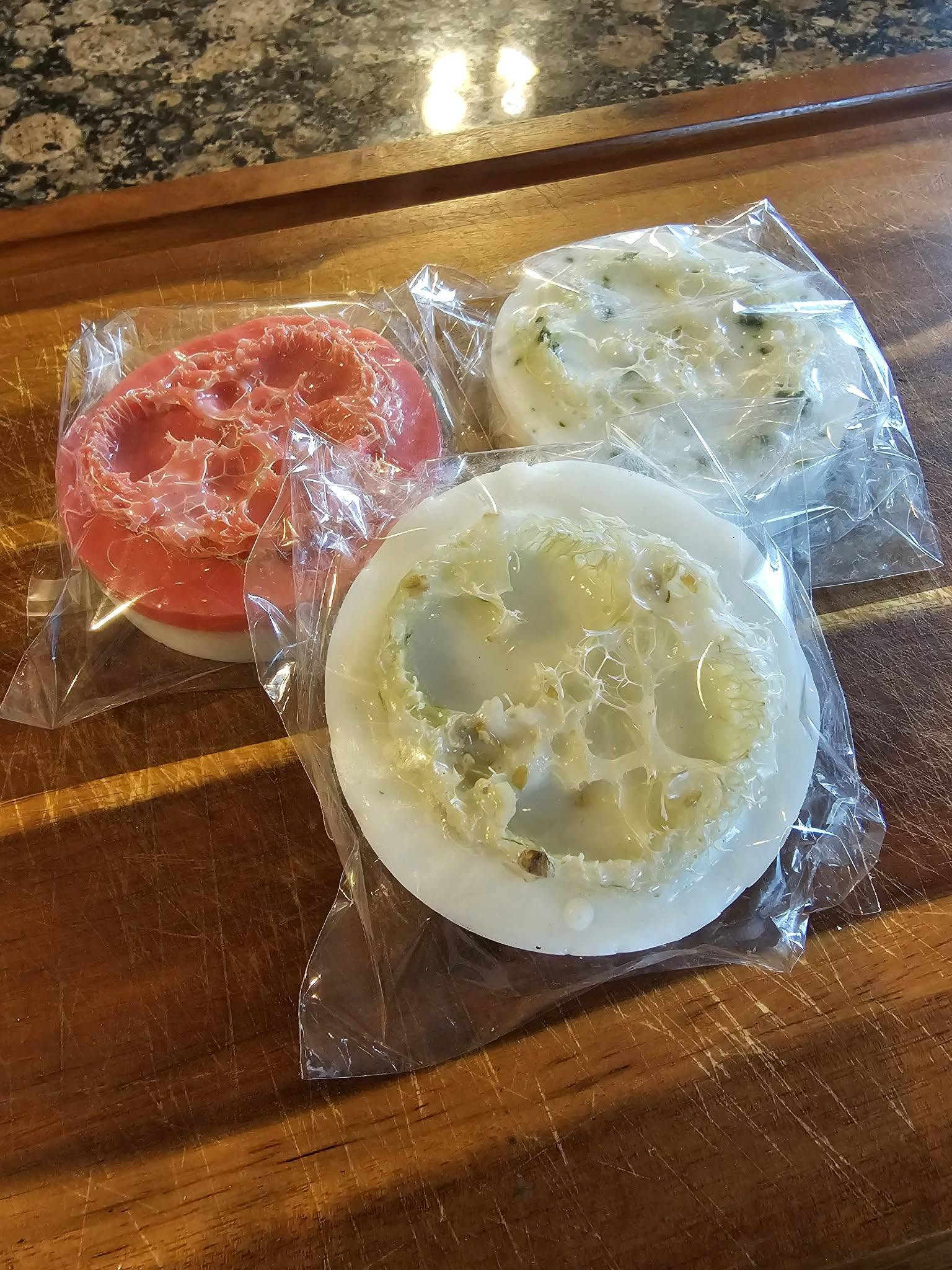 Hernandez Family Farms loofah soap assortment pictured together